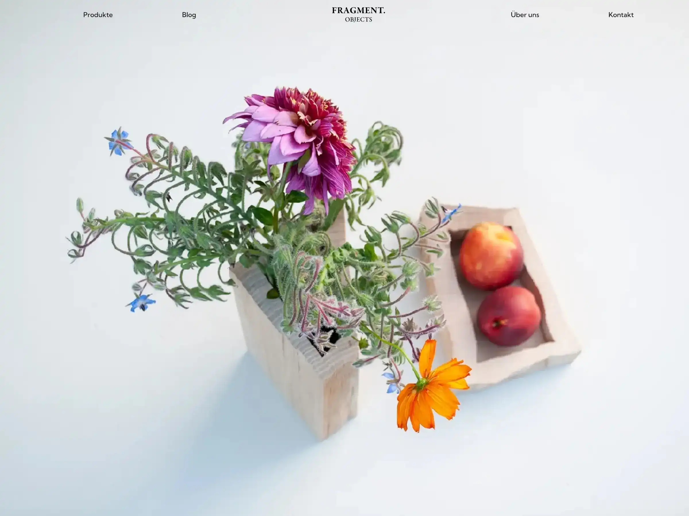 Landingpage von Fragment Objects mit Produktbildern von Holzvasen